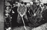 Mr.Harris planting tree at Carne Hill